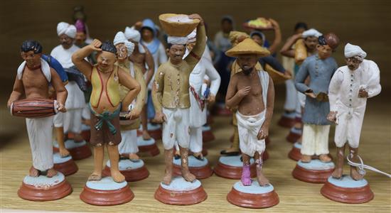 Twenty seven Indian painted clay figures of ethnographic occupations and women